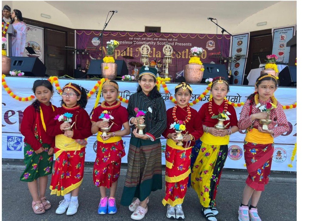 Young performers in traditional Nepali dress at Nepali Mela Scotland